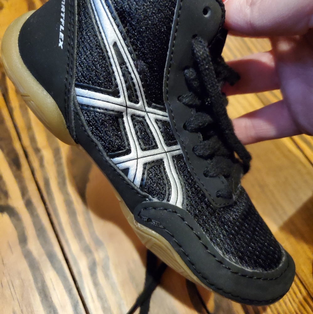 Little boys wrestling shoes